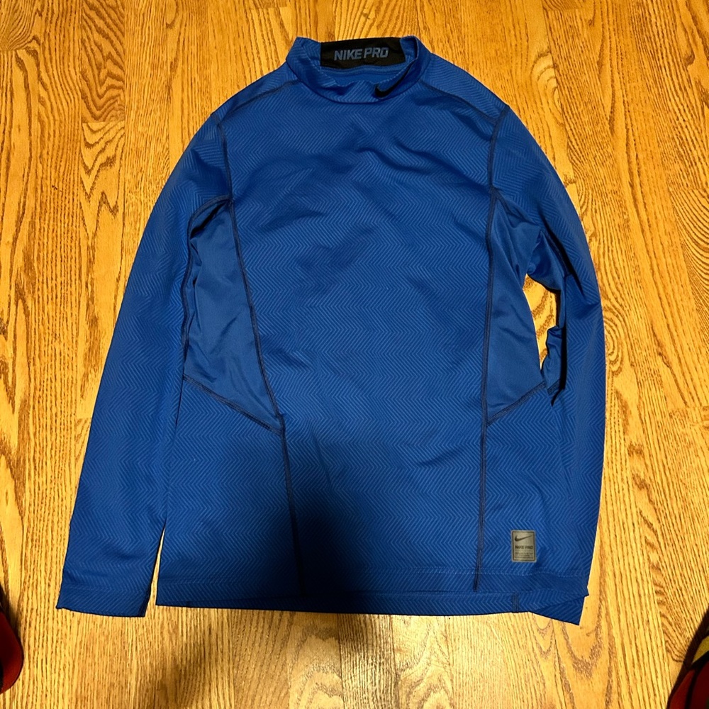 Nike Dri Fit Pro!!! Only worn once!!! Didn’t like the fit!!